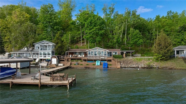 2171 Hansen Point Rd, Torrey, NY 14527 - dock area with stairway, a deck with water view, and a view of trees