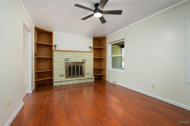 6 Viburnum Pl, New Hartford, NY 13413 - unfurnished living room featuring a ceiling fan, baseboards, wood finished floors, ornamental molding, and a fireplace