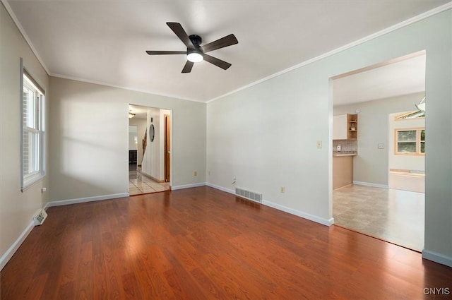 6 Viburnum Pl, New Hartford, NY 13413 - unfurnished bedroom featuring crown molding, wood finished floors, baseboards, and ceiling fan
