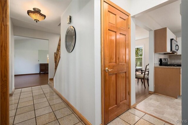 6 Viburnum Pl, New Hartford, NY 13413 - corridor with stairway and baseboards