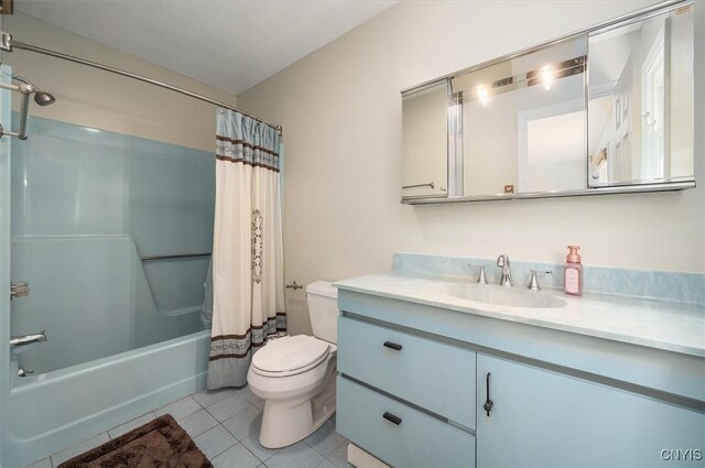 6 Viburnum Pl, New Hartford, NY 13413 - full bathroom featuring toilet, tile patterned floors, vanity, and shower / bath combo with shower curtain