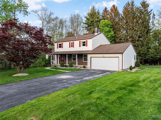 6 Viburnum Pl, New Hartford, NY 13413 - view of front of home with driveway, a garage, a chimney, a front lawn, and covered porch