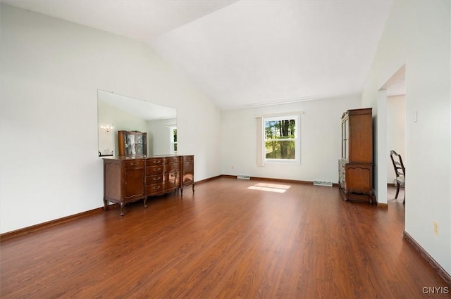 6 Viburnum Pl, New Hartford, NY 13413 - living room featuring wood finished floors, vaulted ceiling, and baseboards