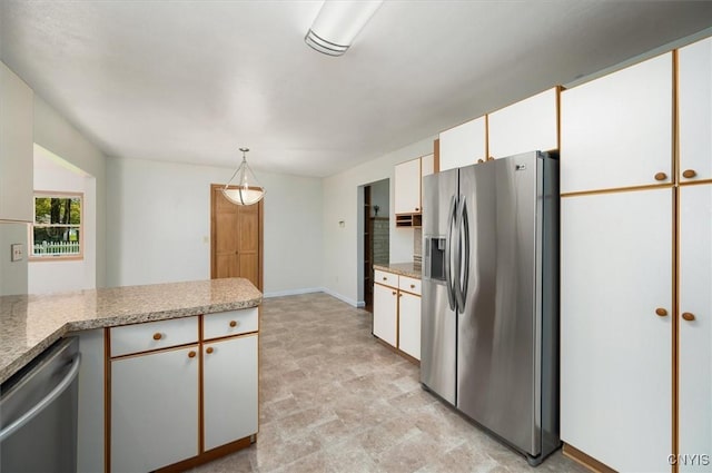 6 Viburnum Pl, New Hartford, NY 13413 - kitchen with stainless steel appliances, white cabinets, pendant lighting, and baseboards