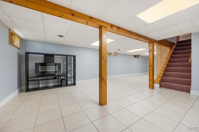 6 Viburnum Pl, New Hartford, NY 13413 - finished below grade area with stairway, a drop ceiling, light tile patterned floors, and baseboards
