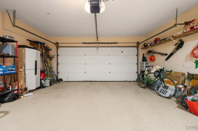 6 Viburnum Pl, New Hartford, NY 13413 - garage featuring a garage door opener