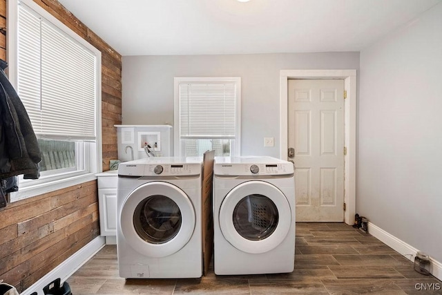 32 E 5th St, Oswego-City, NY 13126 - laundry area with washer and clothes dryer, wood finished floors, wooden walls, and baseboards