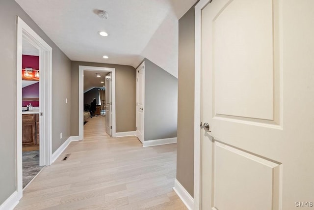 32 E 5th St, Oswego-City, NY 13126 - corridor with light wood-type flooring, recessed lighting, and baseboards