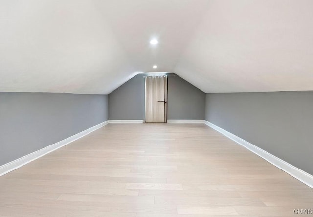 32 E 5th St, Oswego-City, NY 13126 - additional living space with light wood-style flooring, vaulted ceiling, baseboards, and recessed lighting