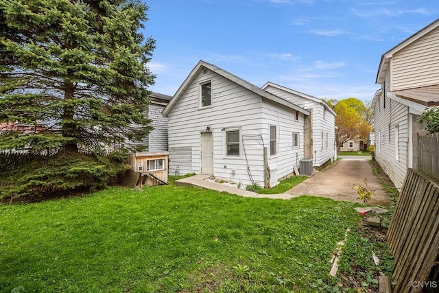 32 E 5th St, Oswego-City, NY 13126 - rear view of house featuring central AC