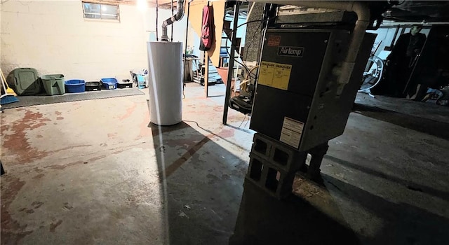 1171 Charles St, Southport, NY 14904 - unfinished below grade area featuring water heater and heating unit