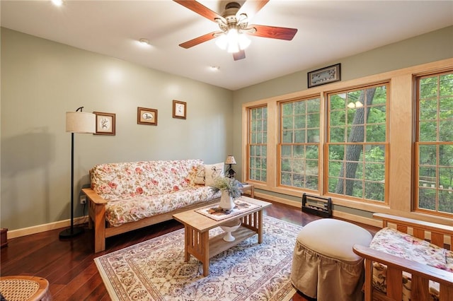 5889 W Bluff Dr, Jerusalem, NY 14478 - living area with wood-type flooring, a ceiling fan, and baseboards