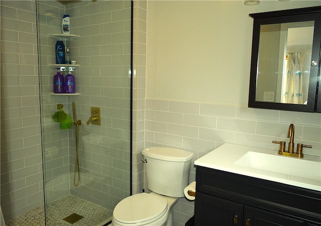 100 Clear Springs Ln, Middletown, NY 12430 - full bath featuring a tile shower, toilet, vanity, and tile walls