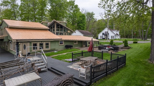 1079 State Route 49, Constantia, NY 13028 - back of house with a deck, outdoor dining area, a yard, and roof with shingles