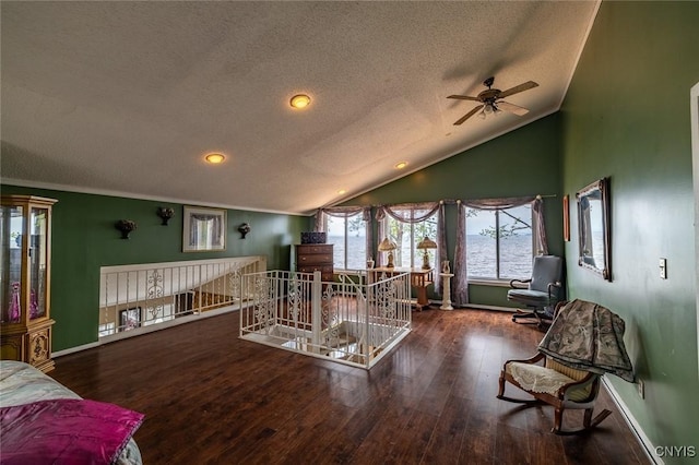 1079 State Route 49, Constantia, NY 13028 - living area with a textured ceiling, lofted ceiling, baseboards, a ceiling fan, and wood finished floors