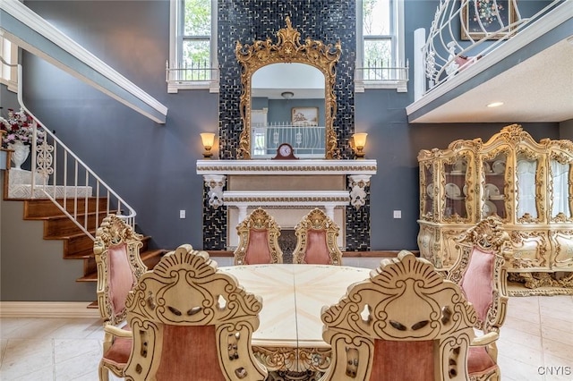 1079 State Route 49, Constantia, NY 13028 - dining space with a high ceiling, stairway, and baseboards