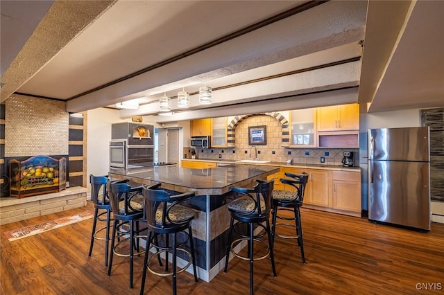 1079 State Route 49, Constantia, NY 13028 - kitchen with stainless steel appliances, dark wood-style flooring, decorative backsplash, and a sink
