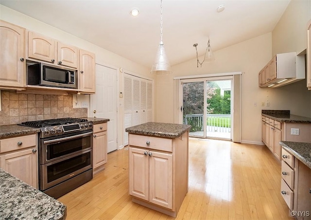 4951 Ravine Rd, Manlius, NY 13066 - kitchen featuring appliances with stainless steel finishes, light brown cabinetry, light wood-style flooring, lofted ceiling, and recessed lighting