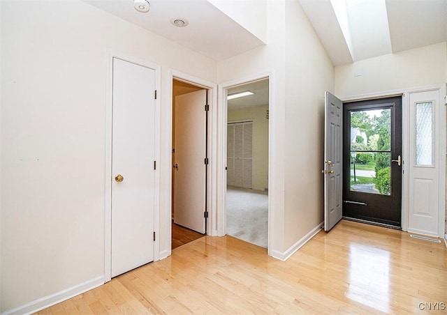 4951 Ravine Rd, Manlius, NY 13066 - foyer featuring light wood-type flooring and baseboards