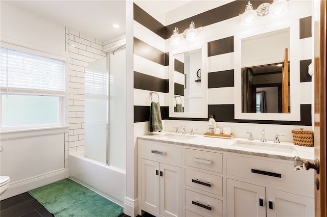 540 List Ave, Irondequoit, NY 14617 - bathroom featuring toilet, double vanity,  shower combination, and tile patterned flooring