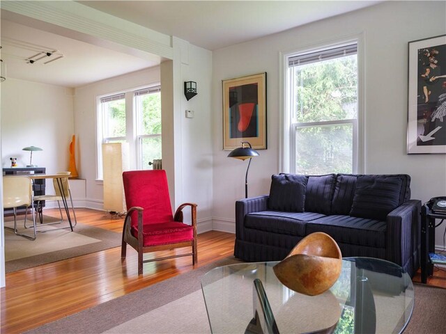 36 Pinetree Ln, Middletown, NY 12430 - living room with wood finished floors, baseboards, and a desk