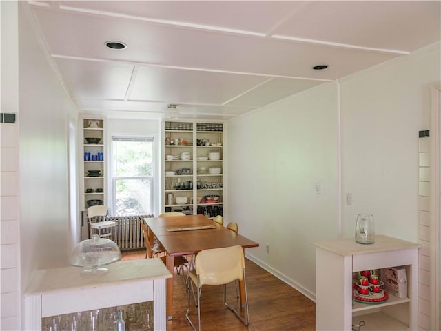 36 Pinetree Ln, Middletown, NY 12430 - dining space featuring wood finished floors, radiator heating unit, built in features, and baseboards