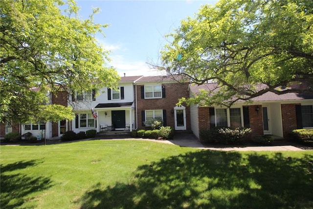 220 New Wickham Dr Unit 220, Penfield, NY 14526 - view of front of house featuring a front lawn and brick siding