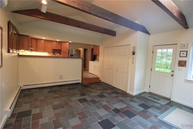 14 Fenner St, Cazenovia, NY 13035 - entryway featuring a baseboard radiator, baseboards, and dark stone finish floors