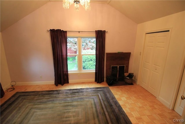 14 Fenner St, Cazenovia, NY 13035 - unfurnished living room with lofted ceiling, a chandelier, and baseboards