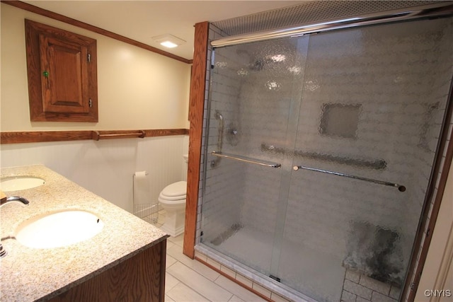 14 Fenner St, Cazenovia, NY 13035 - bathroom featuring a stall shower, double vanity, toilet, and tile patterned floors