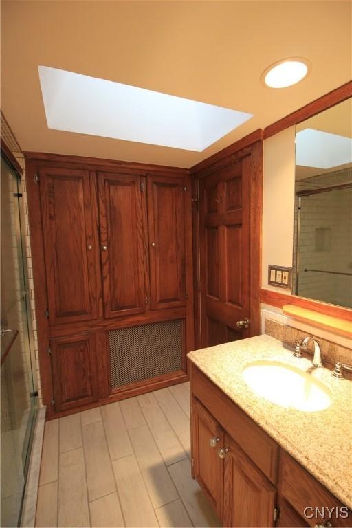 14 Fenner St, Cazenovia, NY 13035 - bathroom with a stall shower and vanity