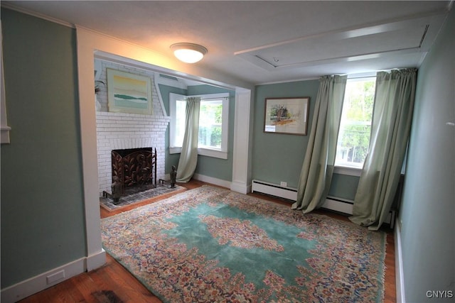 14 Fenner St, Cazenovia, NY 13035 - living room with attic access, baseboards, plenty of natural light, and ornamental molding