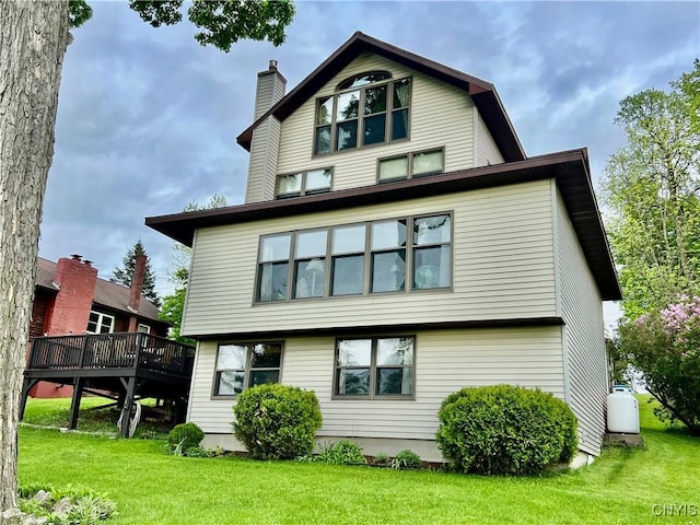 9A Lina St, Morristown, NY 13669 - back of house with a yard, a deck, and a chimney