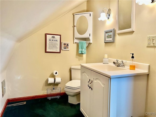 9A Lina St, Morristown, NY 13669 - bathroom featuring vaulted ceiling, toilet, vanity, and baseboards