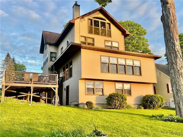 9A Lina St, Morristown, NY 13669 - back of house with a deck, a chimney, and a yard