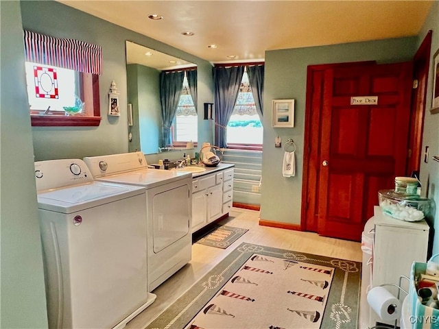 9A Lina St, Morristown, NY 13669 - bathroom featuring separate washer and dryer, wood finished floors, recessed lighting, and vanity