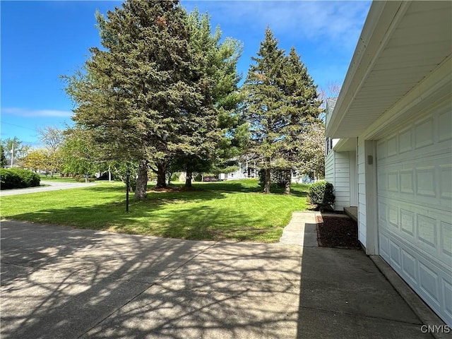 25 Highmore Dr, Oswego-Town, NY 13126 - view of patio / terrace with a garage