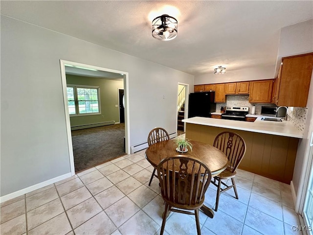 25 Highmore Dr, Oswego-Town, NY 13126 - dining room featuring baseboard heating, light tile patterned floors, baseboards, stairway, and a baseboard radiator