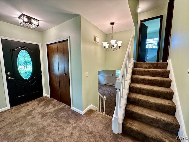 25 Highmore Dr, Oswego-Town, NY 13126 - carpeted foyer featuring a chandelier, baseboards, and stairs