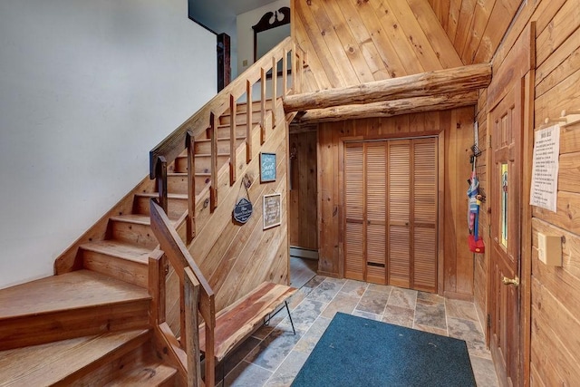 2165 Hamden Hill Rd, Hamden, NY 13782 - foyer entrance featuring wood walls, stairway, and stone finish floors
