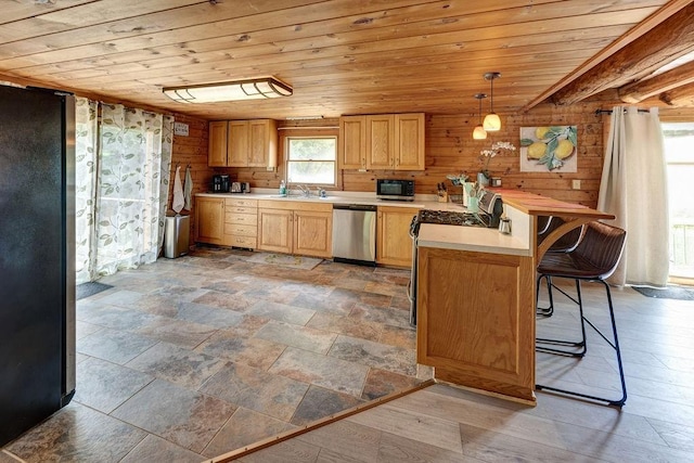 2165 Hamden Hill Rd, Hamden, NY 13782 - kitchen with appliances with stainless steel finishes, wooden ceiling, light countertops, a sink, and a peninsula