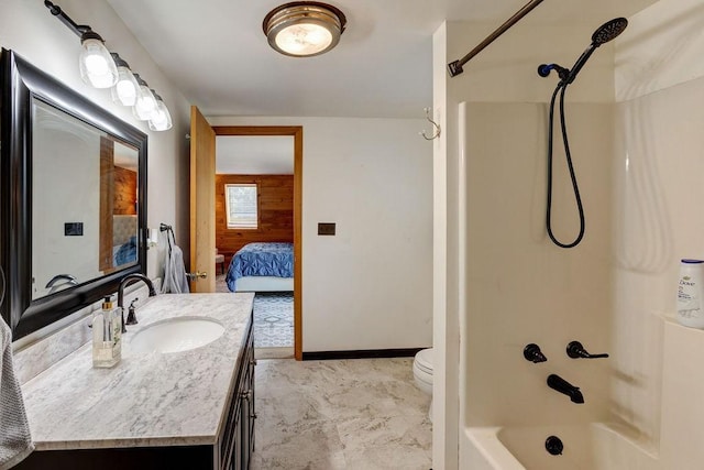 2165 Hamden Hill Rd, Hamden, NY 13782 - bathroom with vanity, washtub / shower combination, toilet, and ensuite bathroom