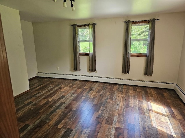 4636 Kirkwood Rd, Cohocton, NY 14826 - unfurnished room featuring healthy amount of natural light, wood finished floors, and baseboard heating