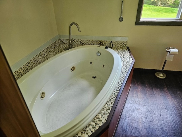 4636 Kirkwood Rd, Cohocton, NY 14826 - full bathroom with a tub with jets and baseboards