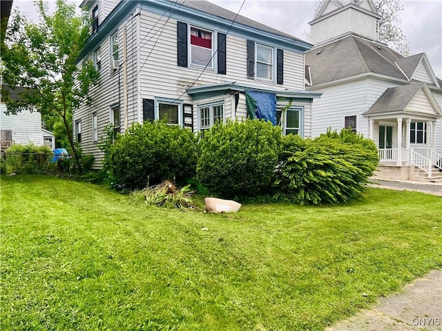 1703 Whitesboro St, Utica, NY 13502 - view of front of house with a front yard