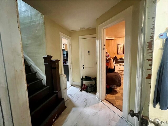 1703 Whitesboro St, Utica, NY 13502 - hall featuring light marble finish flooring and stairs