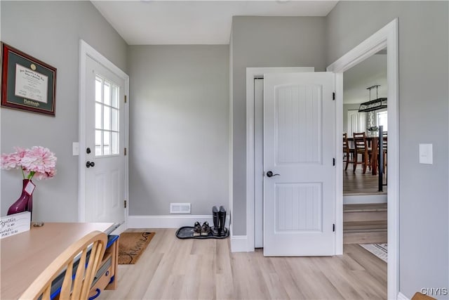 436 Centre St, Cape Vincent, NY 13618 - foyer entrance with wood finished floors and baseboards