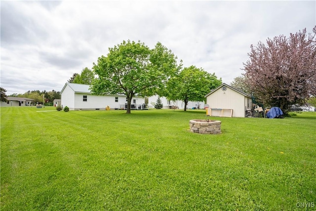 436 Centre St, Cape Vincent, NY 13618 - view of grassy yard with a fire pit