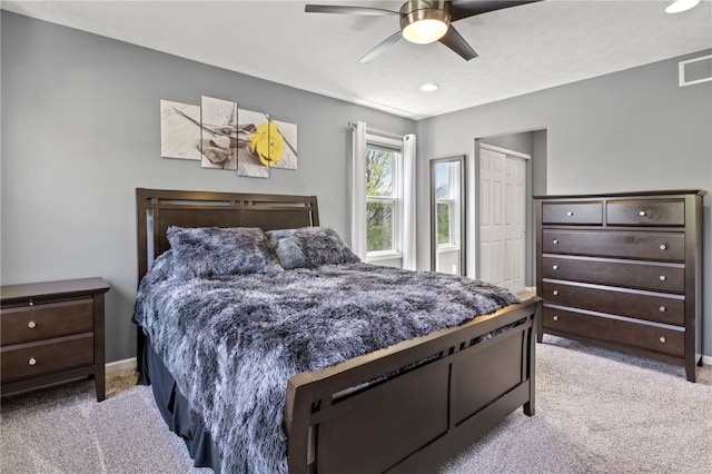1030 Whistlers Cove Ln, Greece, NY 14612 - bedroom with carpet, a ceiling fan, a closet, baseboards, and recessed lighting