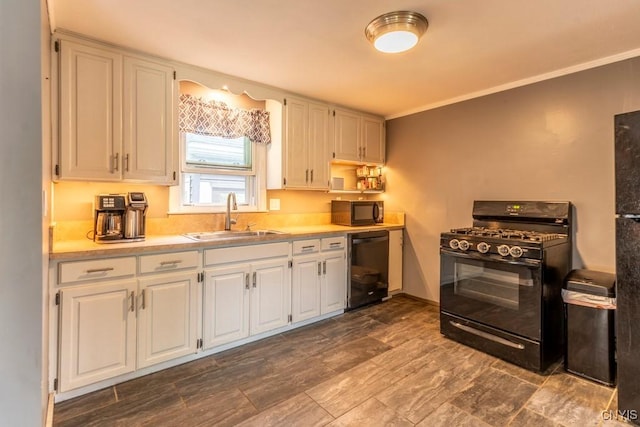 906 Beley Ave, Salina, NY 13211 - kitchen with black appliances, a sink, light countertops, ornamental molding, and white cabinetry